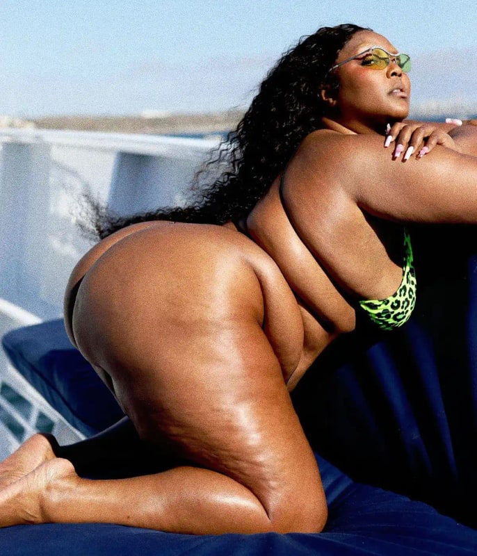 Lizzo Epitomizes Hot Girl Summer In Neon Green Cheetah Print Bikini Promo